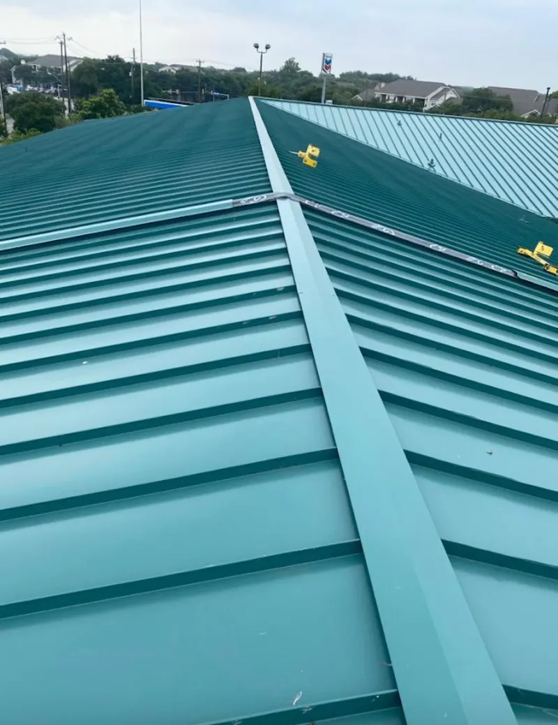 Green commercial metal roof ridge and valley for Metal Roof Repair in Iron Mountain
